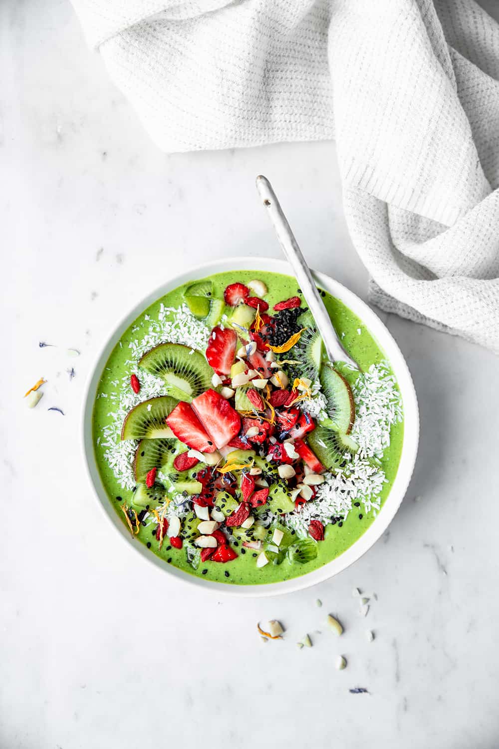 Bright Green Smoothie Bowl With Fruit On Top